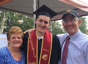 Max with mum and pop grad